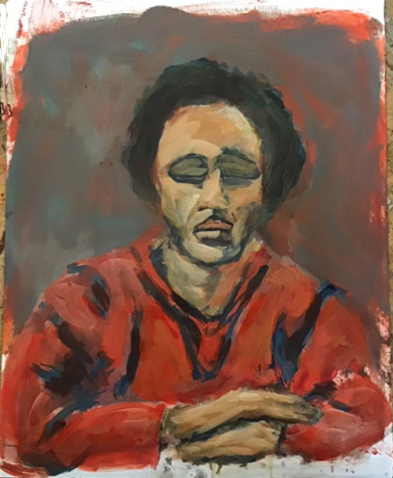 Young man in red closed eyes